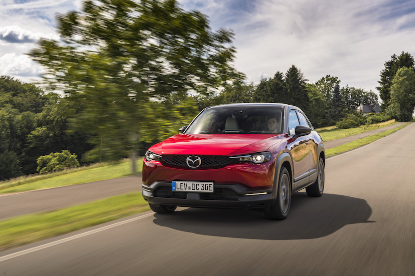 Red Mazda CX30 front driving